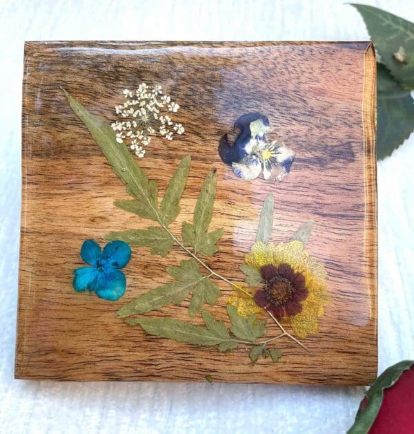 Square wood coaster with dried flowers